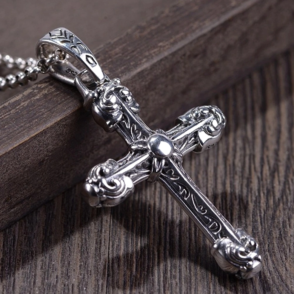 925 silver gothic cross pendant with floral scroll engravings, rounded tips, and detailed pendant bail closure
