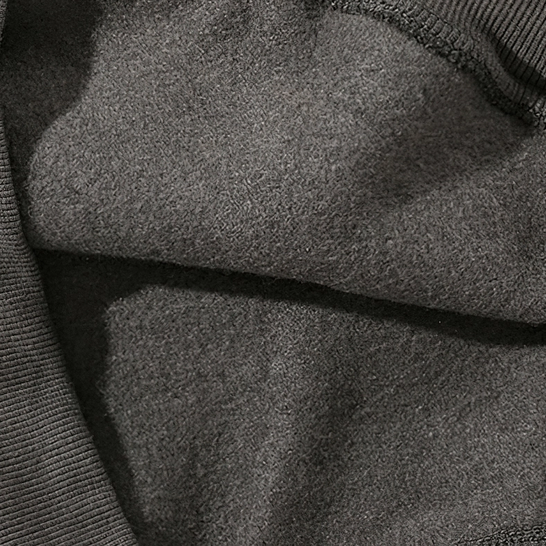 Olive green alternative hoodie showing chest print placement and graphic quality