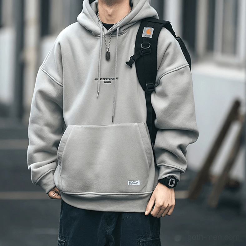 Olive green gothic hoodie showing kangaroo pocket and ribbed construction detail