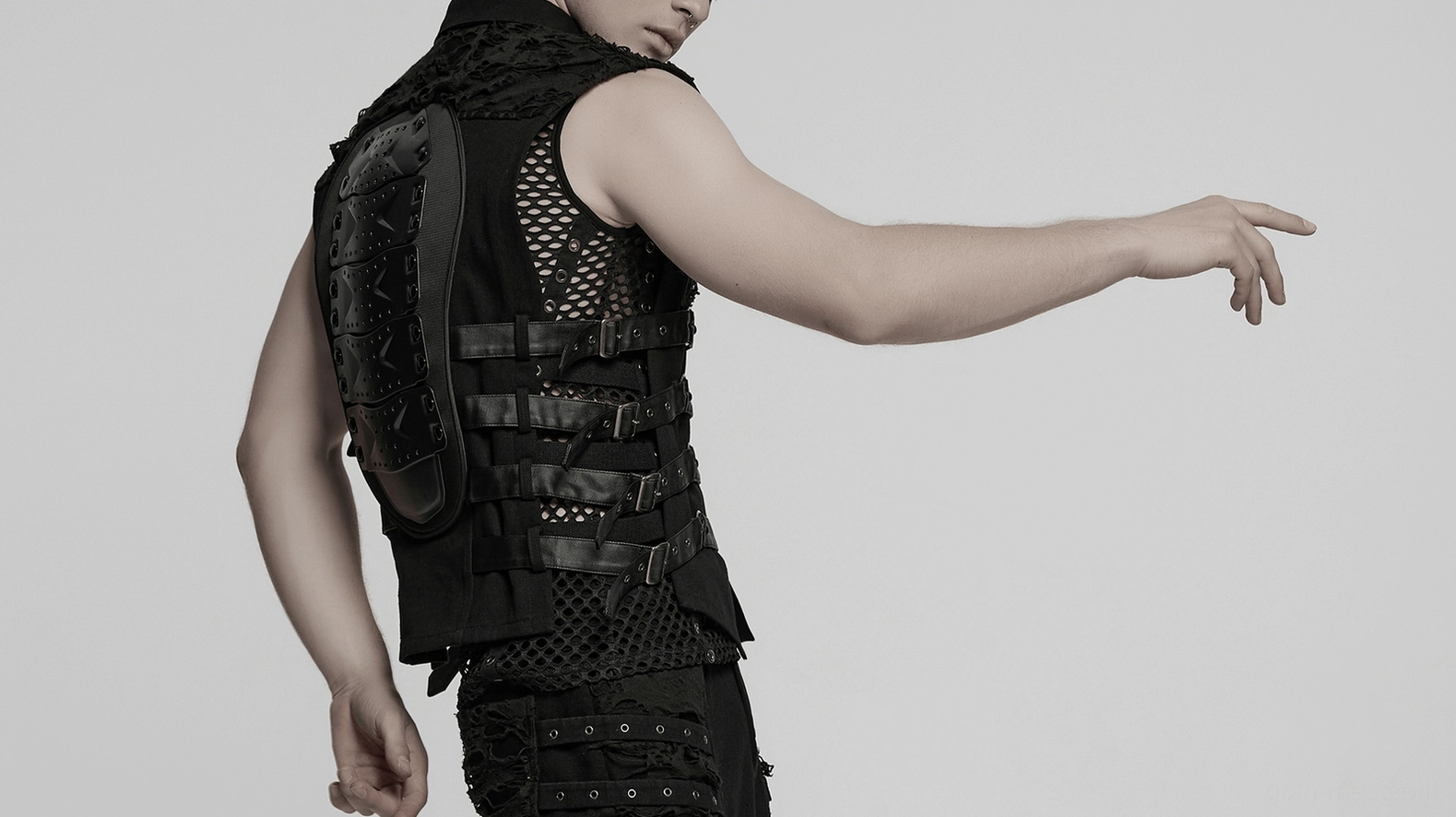Full length cyberpunk gothic vest on model - demonstrating fit, drape, overall proportions, and how armor back panel appears when worn