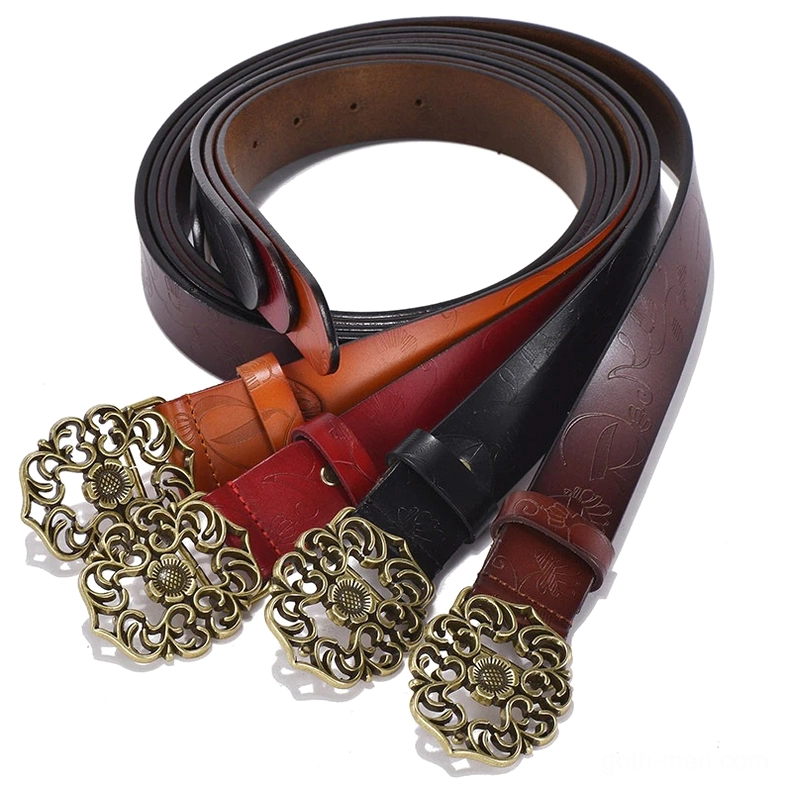 Set of assorted embossed leather gothic belts in multiple colors with antique bronze carved flower buckles, top-down flat lay