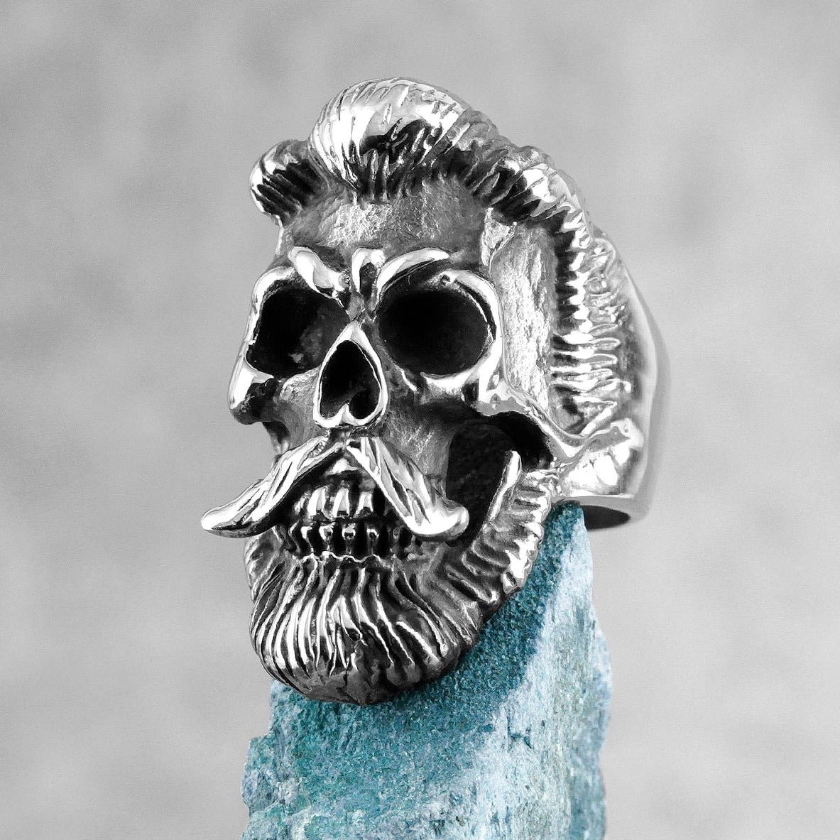 Bearded skull gothic ring side profile view blue stone block carved beard mustache details