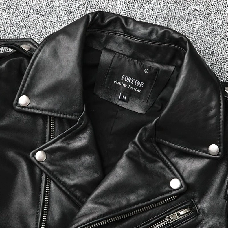 Gothic biker jacket collar detail close-up metal snap buttons silver zipper polished leather