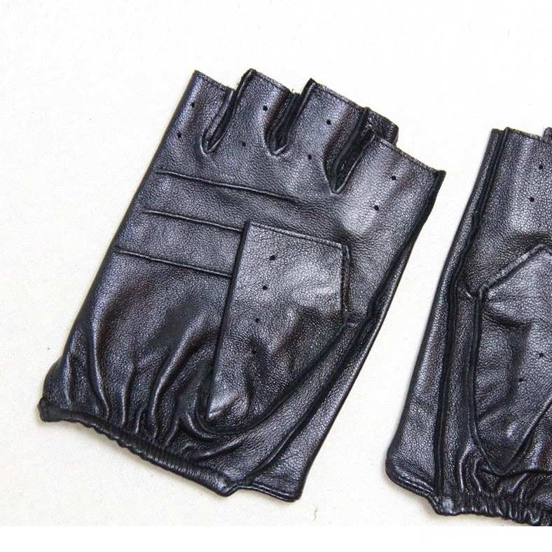 Black and dark blue half-finger leather gloves with elastic wrist and reinforced stitched seams, flat lay overhead shot