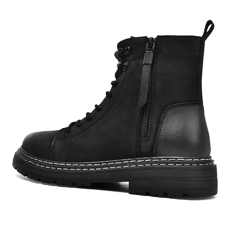 Side profile of black leather combat boots highlighting functional side zipper and construction