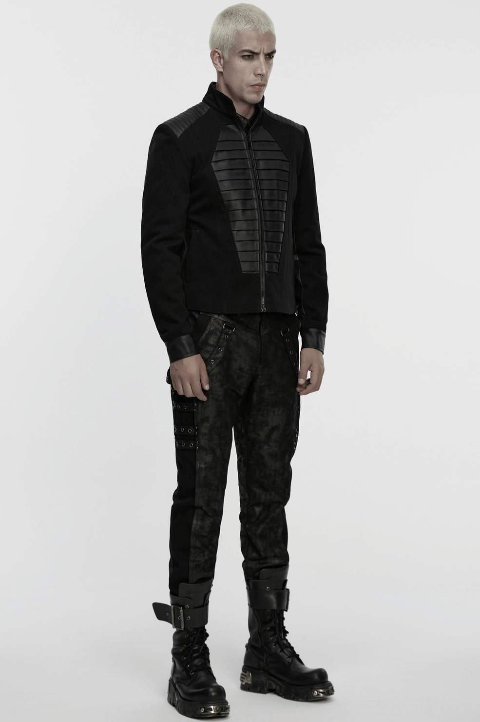 Black distressed gothic slim pants showing metal eyelet placement and dark alternative styling