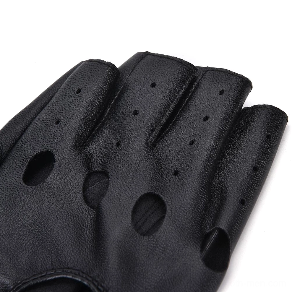 Half-finger glove close-up showing matte black leather perforated texture