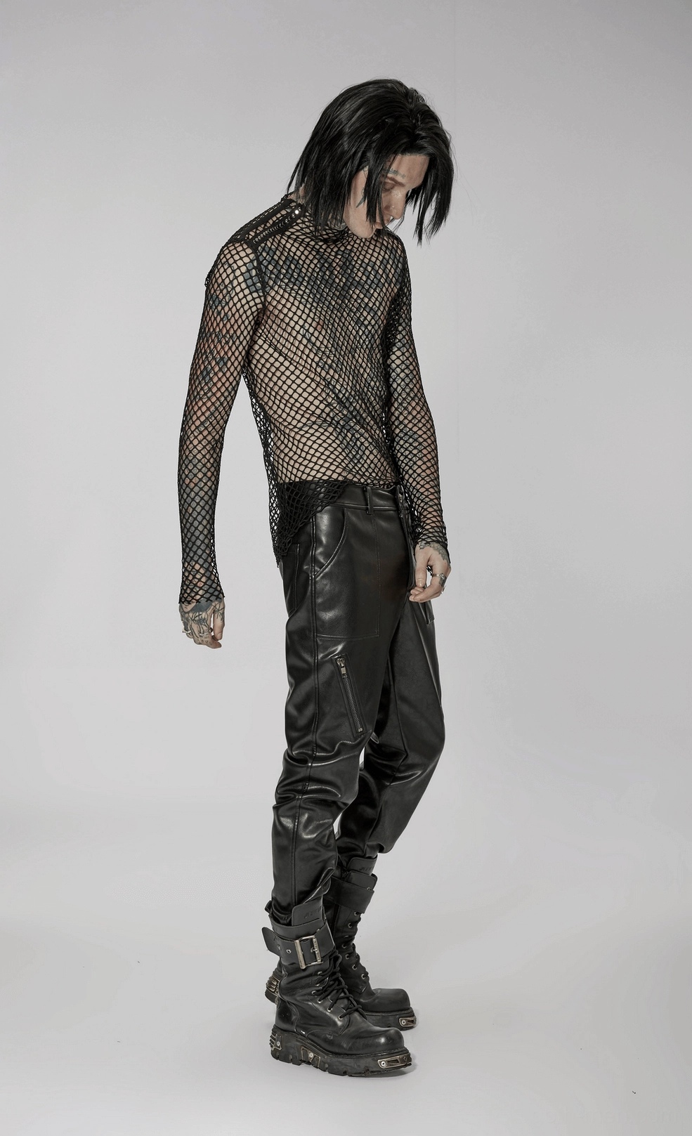 Black fishnet mesh top overall fit and silhouette on tattooed male model