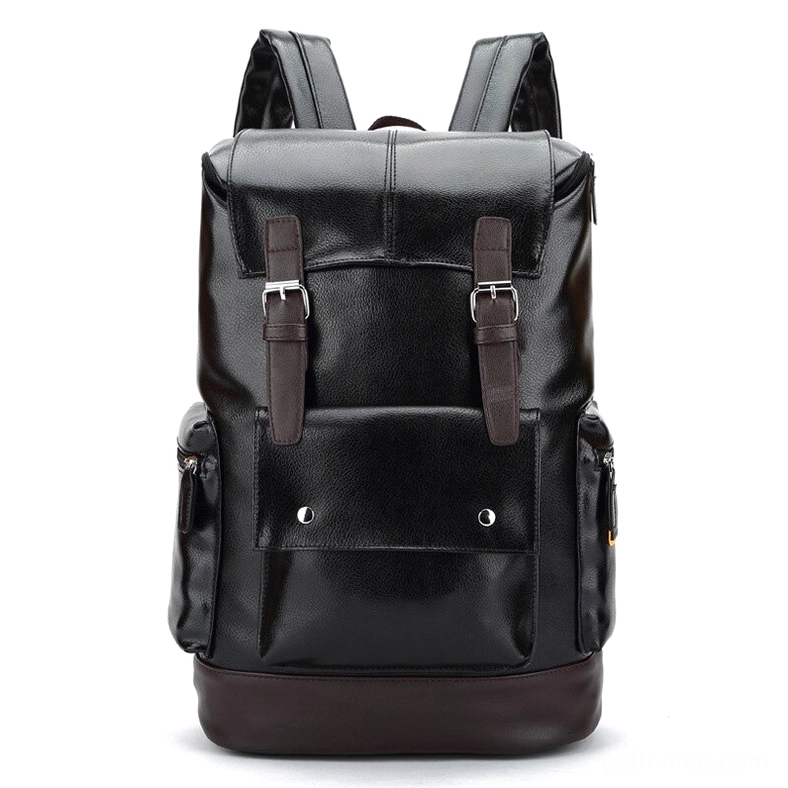 Black gothic utility backpack front view showing dual buckle straps, brown leather accents, and structured silhouette