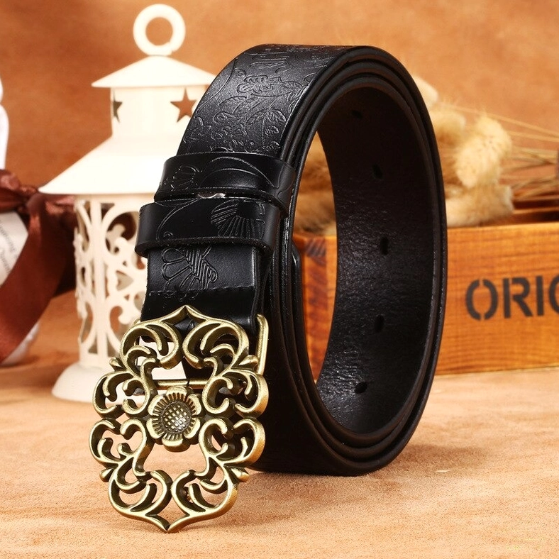 Black leather gothic women's belt with embossed texture and antique bronze buckle, three-quarter front view with lifestyle styling