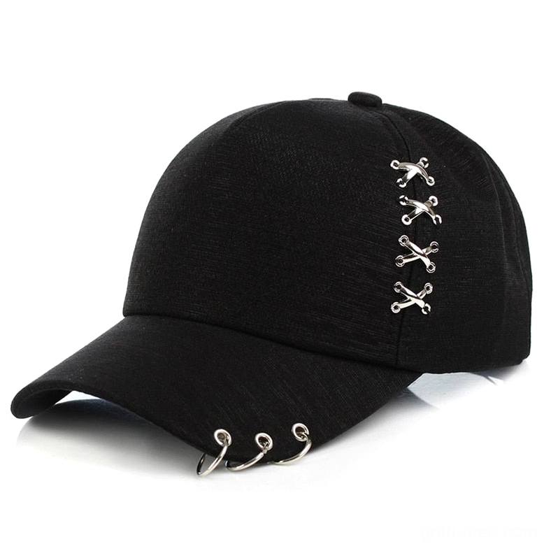 Black metal ring gothic baseball cap with cross buckles and brim ring embellishments front three-quarter view