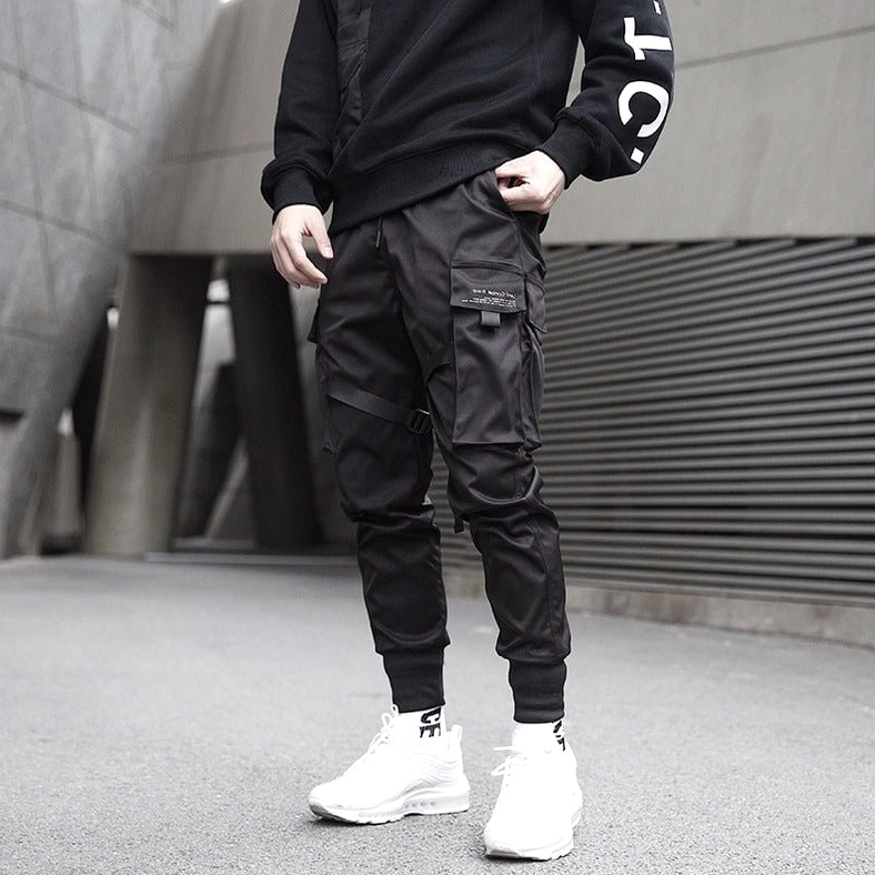 Black cargo pants styling with oversized sweatshirt - full body front view