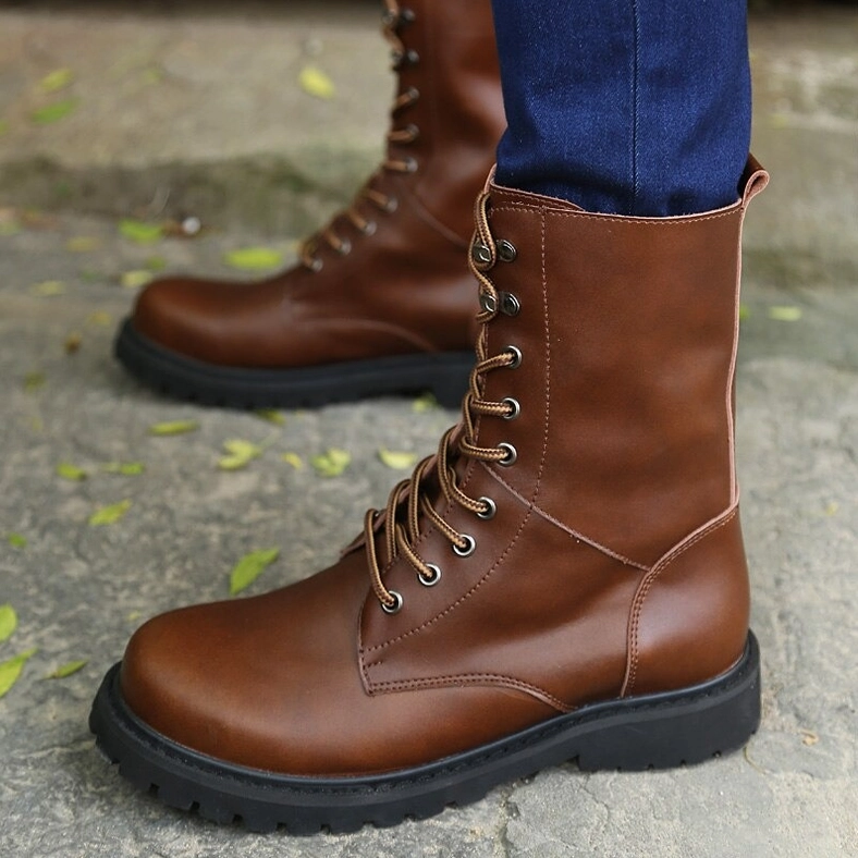 Black high-top gothic combat boots front-side flat view highlighting precise lace-up construction and sleek silhouette