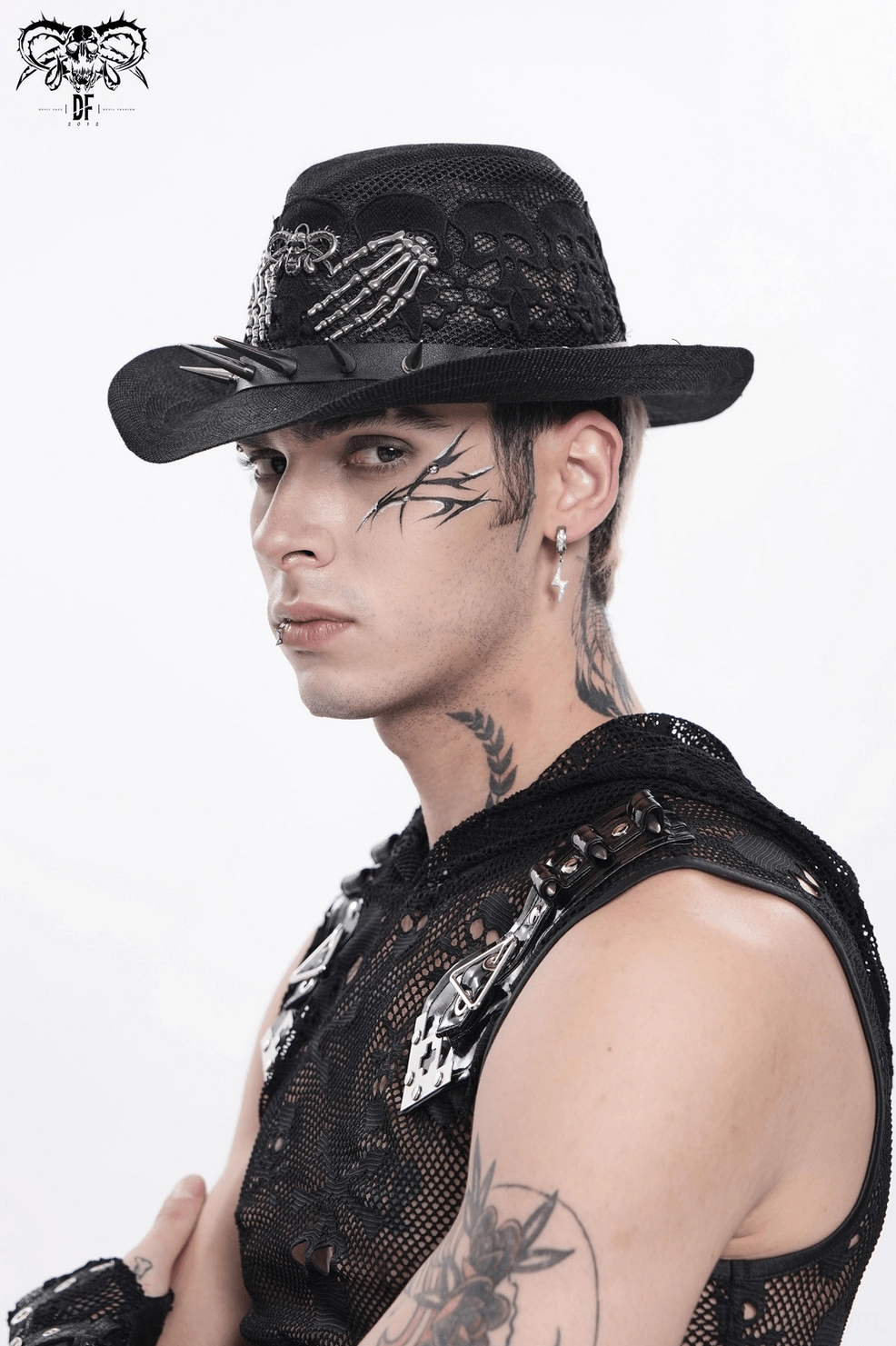 Black gothic cowboy hat with skull lace pattern and skeleton hand decoration, product photography