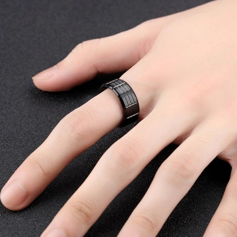 Black gothic grid ring worn on hand dark background showing minimalist aesthetic