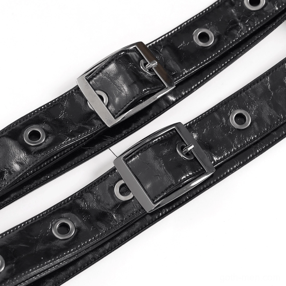 Black gothic lace-up shoulder harness vest detail shot showing buckle strap construction