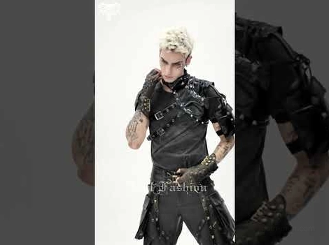 Black gothic harness worn with matching tee and fingerless gloves on blonde male model in side view