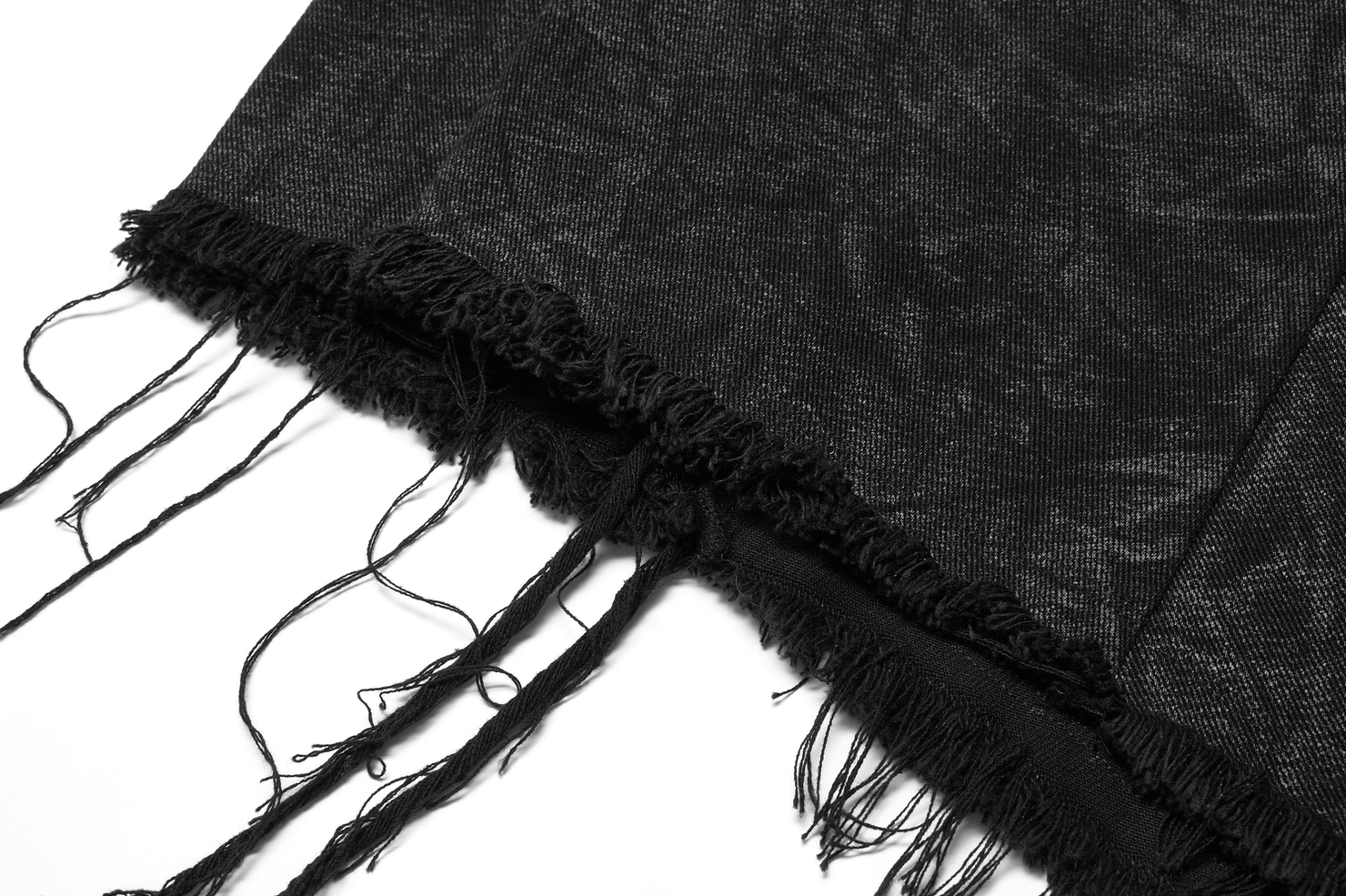 Alternative male model styling black textured gothic kilt with harness straps, showing versatile goth fashion application