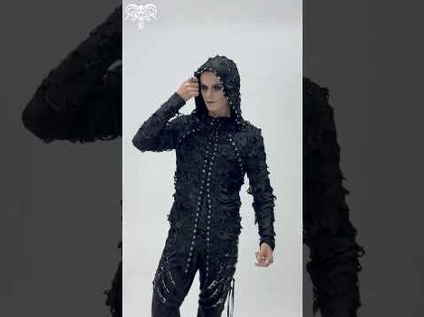 Male model wearing complete black gothic lace-up hooded sweatshirt outfit, adjusting hood with full lace-up front closure