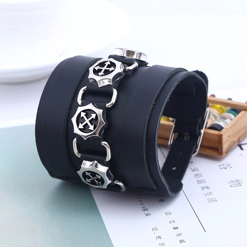 Black wide leather gothic cuff bracelet side angle view, vintage punk jewelry display