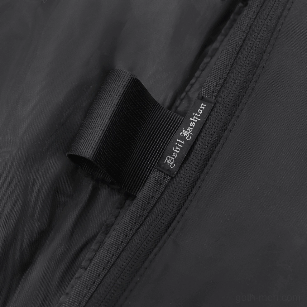 Overall structured silhouette of black gothic messenger bag showing professional proportions and spike placement