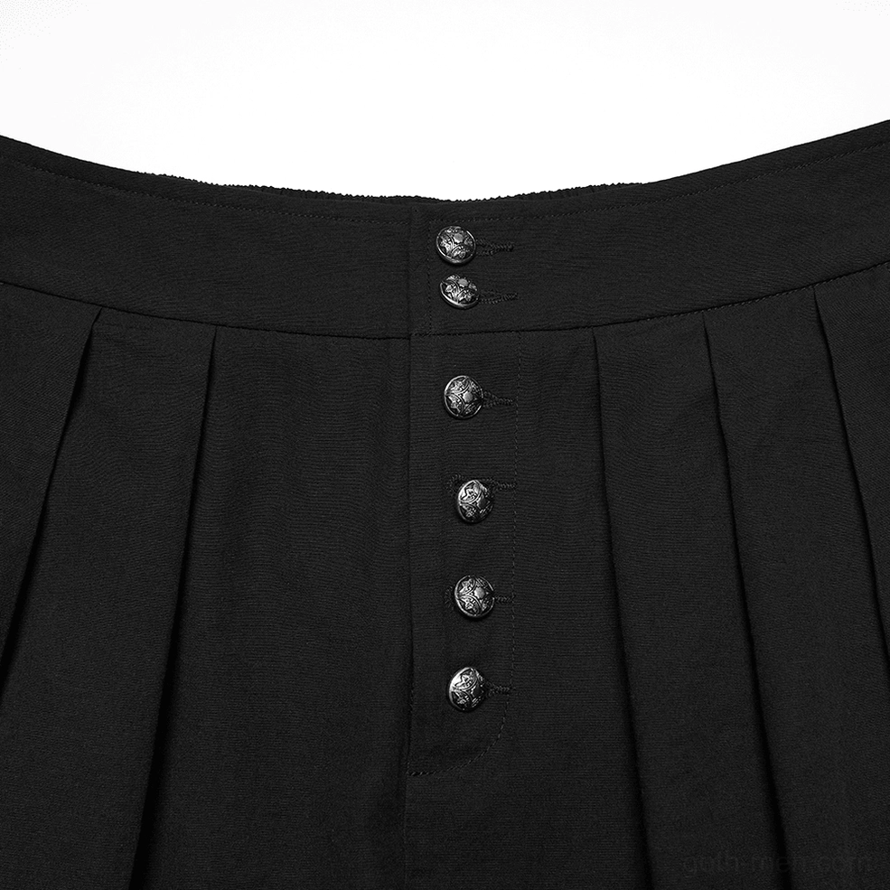 Close-up top-down view of black gothic pants waist area, showing vintage metal button placket and pleated waistline craftsmanship