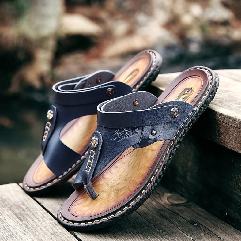 Black gothic sandals back heel view showing strap structure and rivets