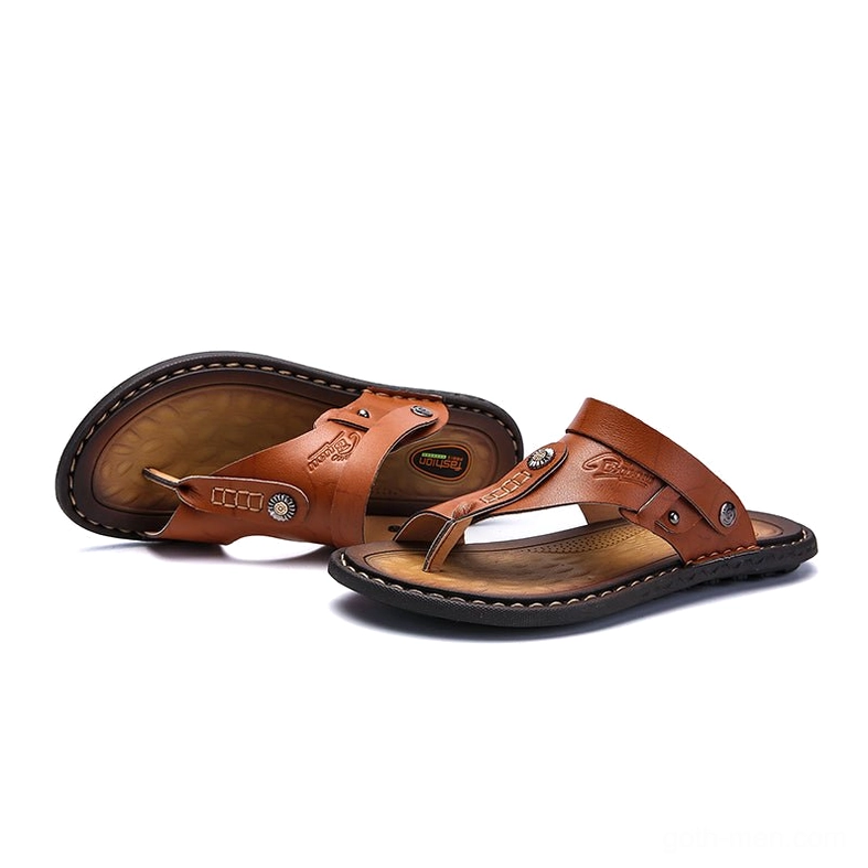 Black gothic sandals with metal rivets - overhead view showing strap placement