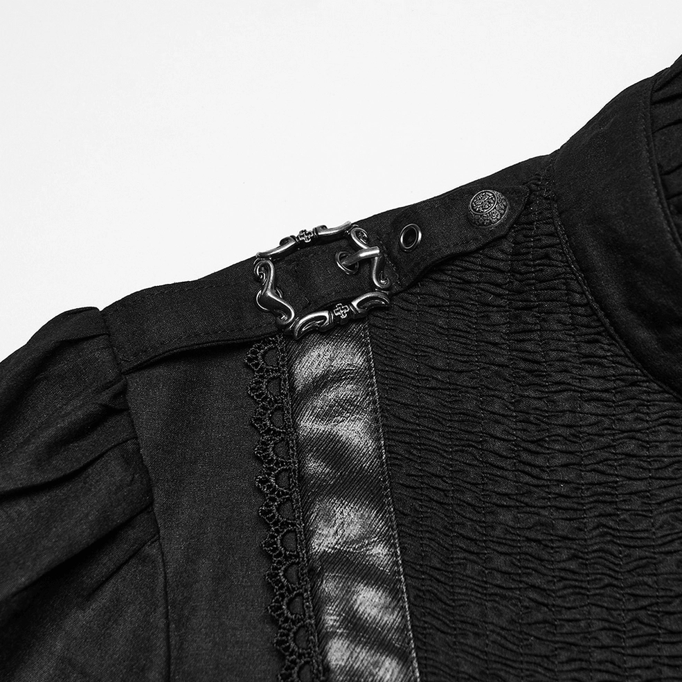 Black gothic shirt shoulder hardware - close-up detail showing metal buckle strap with lace and leather trim