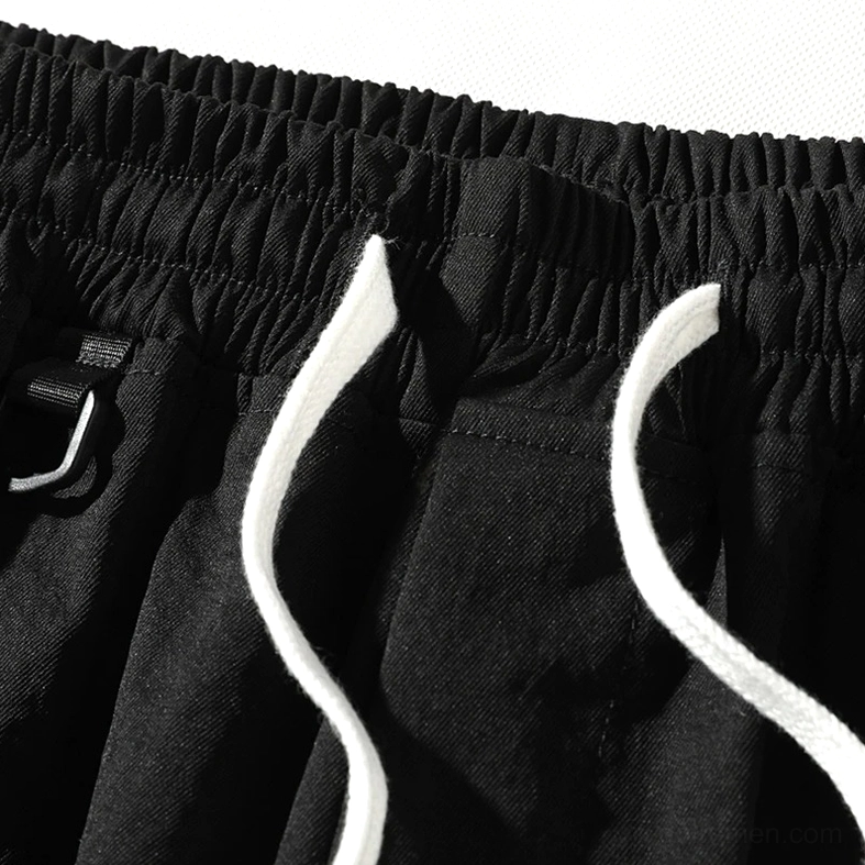 Gothic cargo shorts in solid black featuring relaxed fit and functional pockets