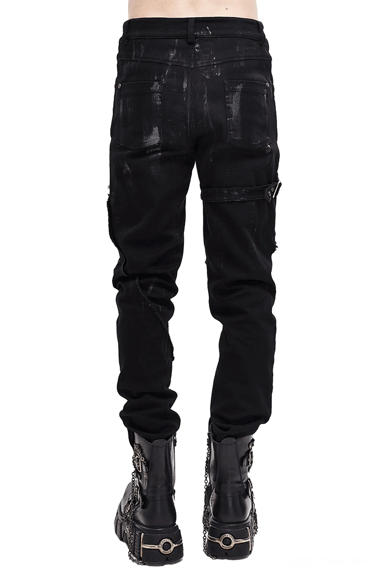 Rear view of black gothic slim-fit trousers featuring distressed texture and cargo pocket detail