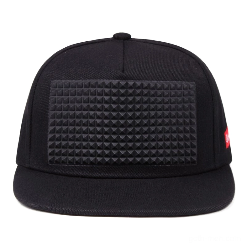 Black spike snapback cap front view showing large pyramid spike panel placement, gothic aesthetic headwear