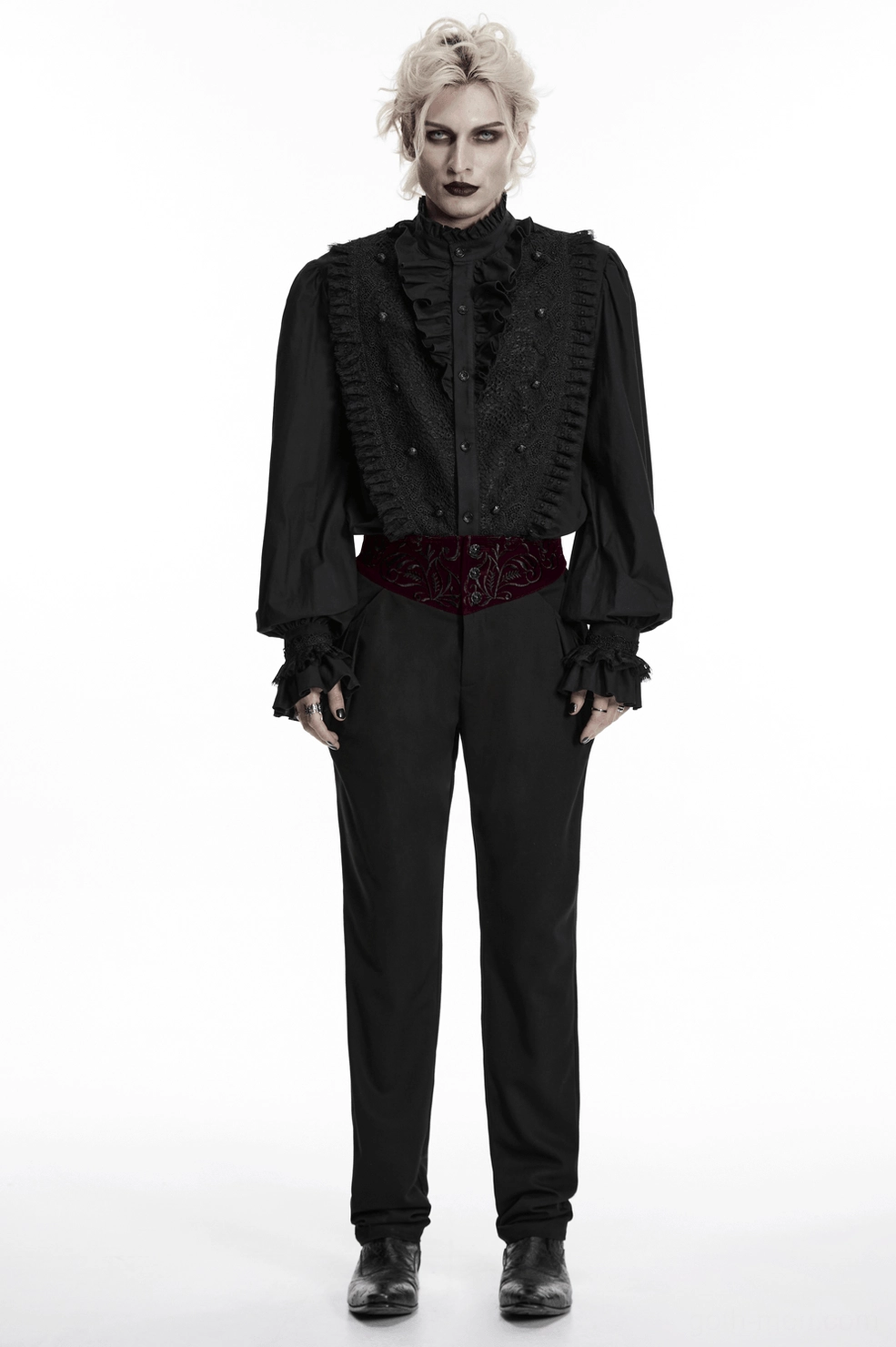 Product lifestyle photo of black gothic slim-fit trousers styled with formal alternative fashion