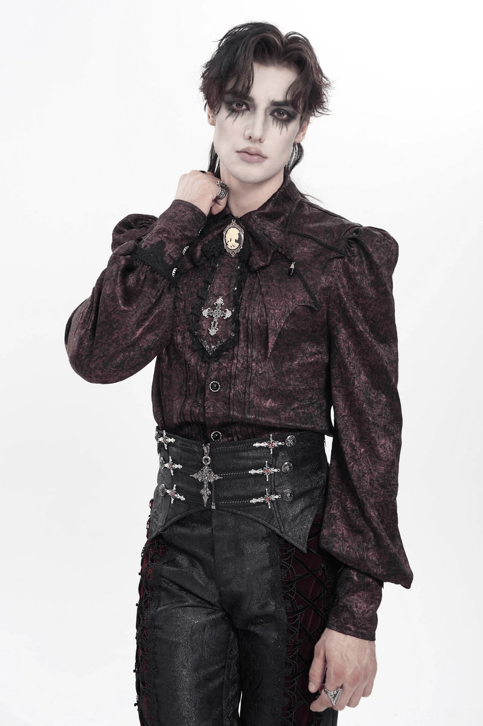 Styled shot of black brocade gothic corset worn over clothing, demonstrating layering capability and fit