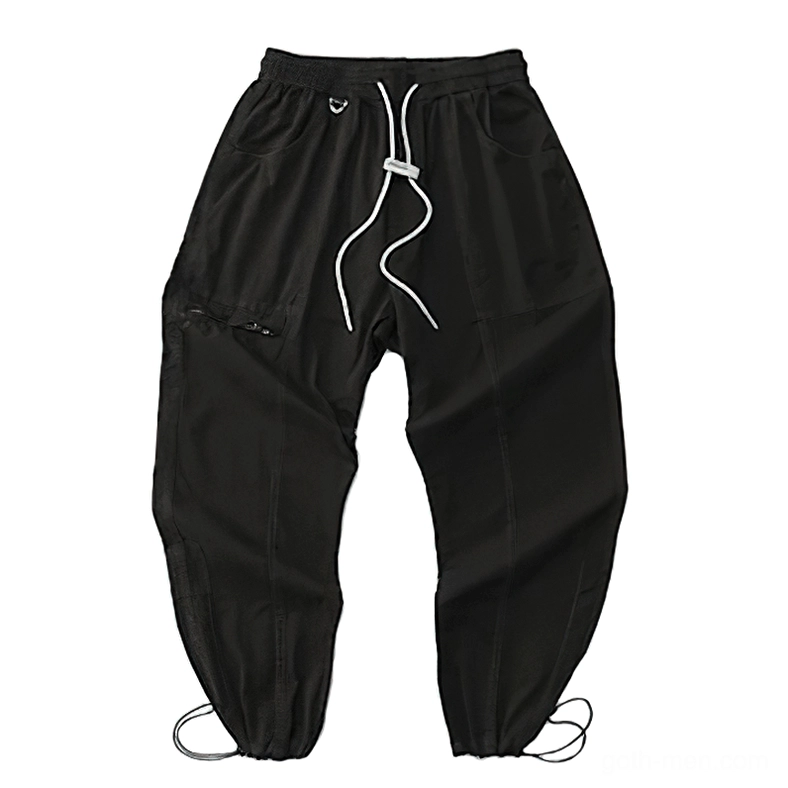 Black gothic cargo harem pants flat lay display showing drawstring waist, functional ankle drawstrings, and loose silhouette