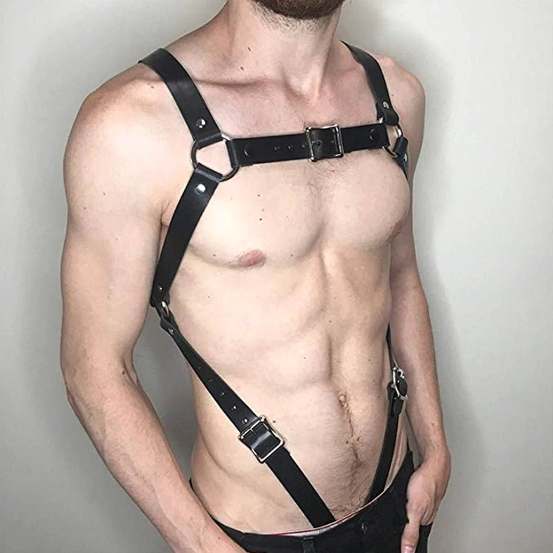 Black leather body harness side three-quarter view showing adjustable side straps and front chest buckle on male model