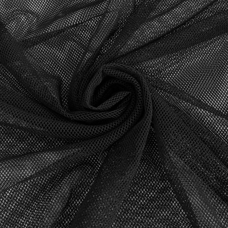 Black mesh fabric draped close-up showing stretchy polyamide weave and transparency of gothic top