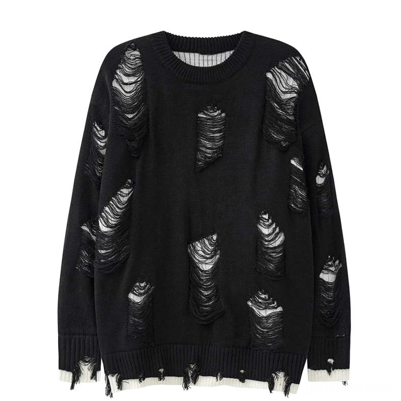 Black distressed oversized knit sweater with ripped patch designs and frayed hem - front flat lay product shot
