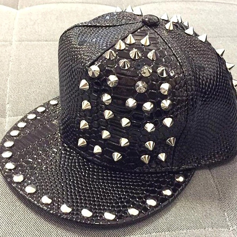 Studded snakeskin punk cap 3/4 right front angle highlighting spike and stud placement