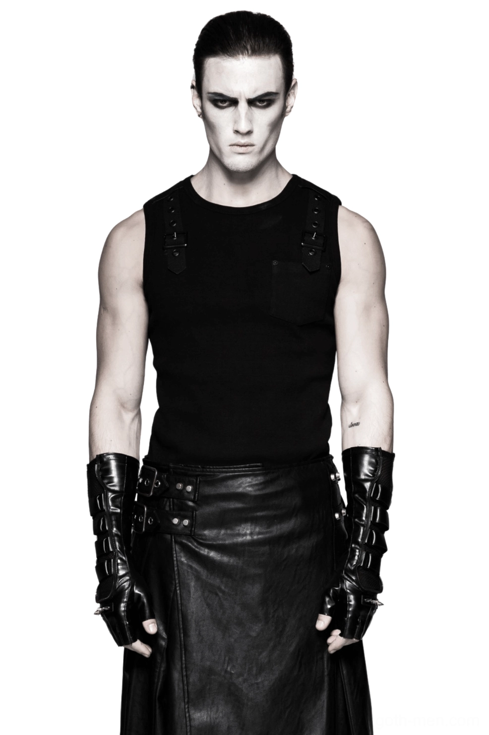 Black spiked gauntlet gloves front view on male model wearing gothic outfit with tank top and leather skirt