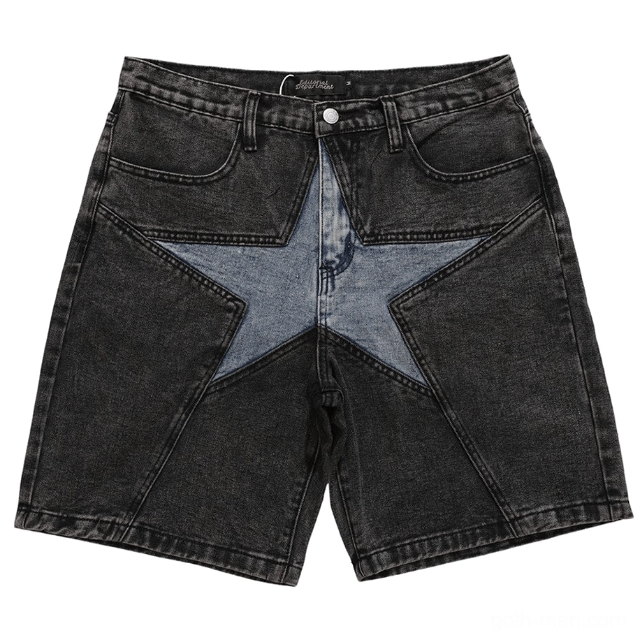 Black denim shorts with light blue star patchwork panels, front flat lay shot showcasing alternative gothic style