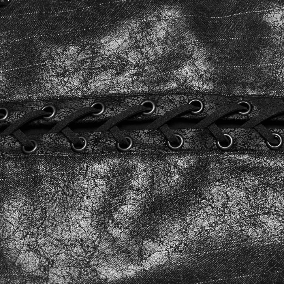 Close-up detail of black steampunk waistcoat side lace straps, metal round eyelets, and cracked leather surface