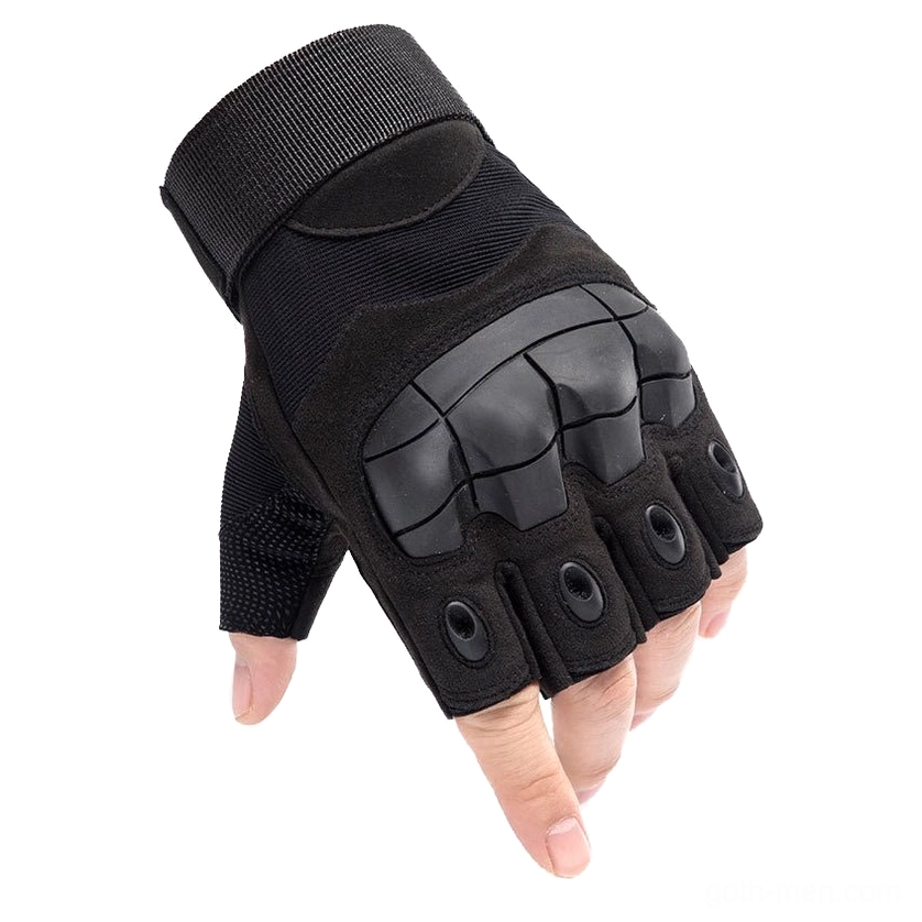 All-black tactical half-finger combat gloves close-up front view, carbon fiber knuckle armor with breathable mesh panels detail