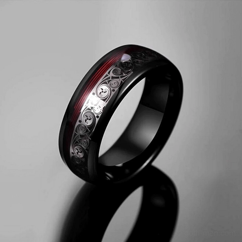 Black tungsten steel gothic ring with ethnic silver pattern inlay, oblique side angle on gradient background