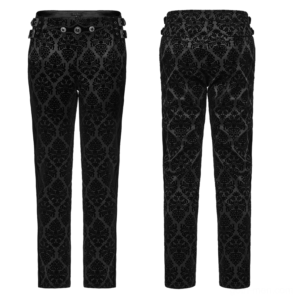 Black velvet damask gothic suit pants front flat lay showing decorative metal waist hardware and gemstone buckles