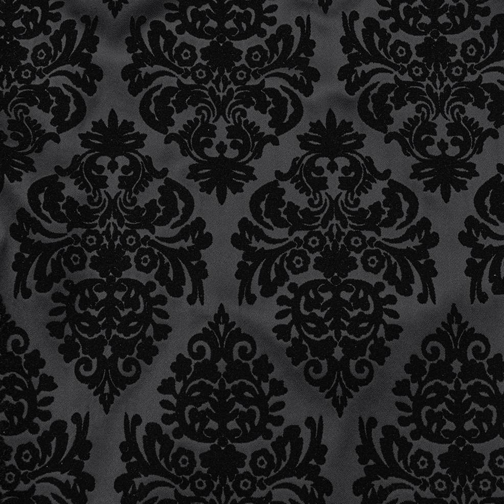Black velvet damask gothic suit pants flat lay top-down view showcasing full damask flocking pattern and hardware