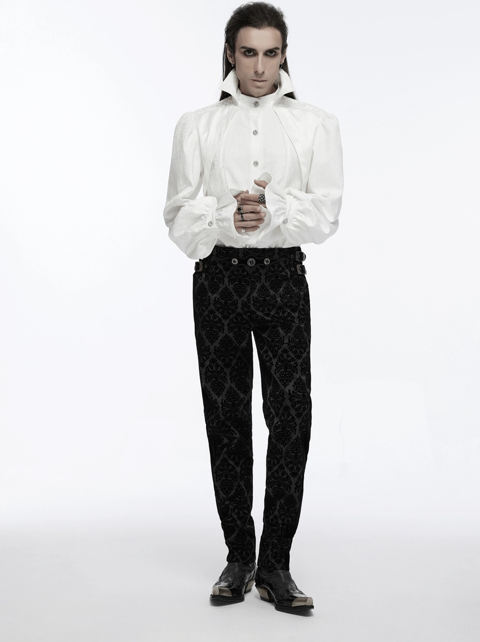 Black velvet gothic suit pants full garment flat lay displaying complete damask pattern and structural design