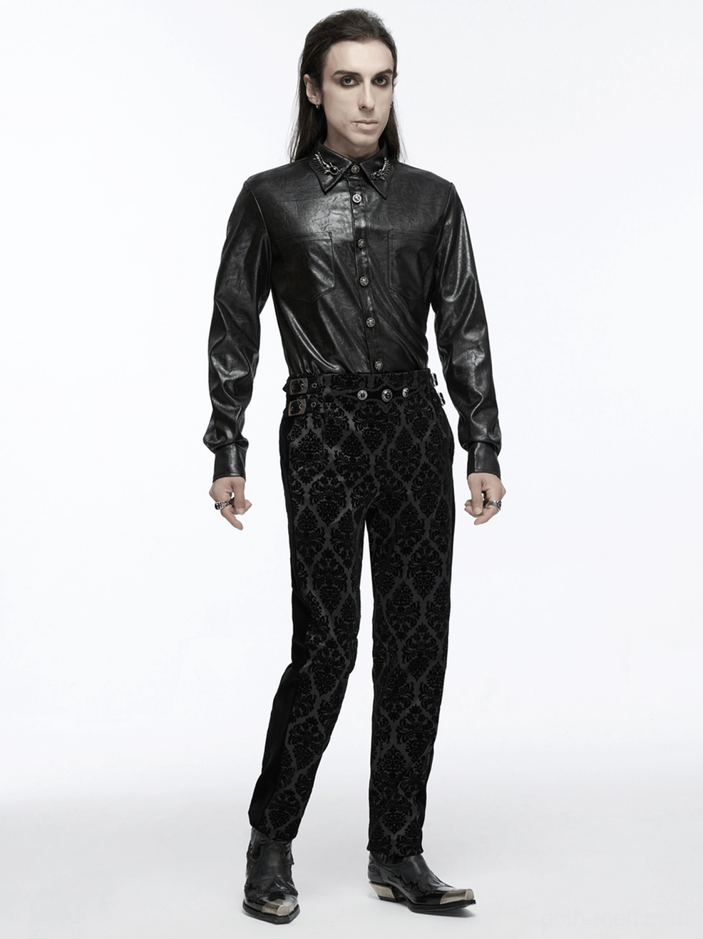 Black velvet damask gothic pants showing hem detail and tailored construction quality