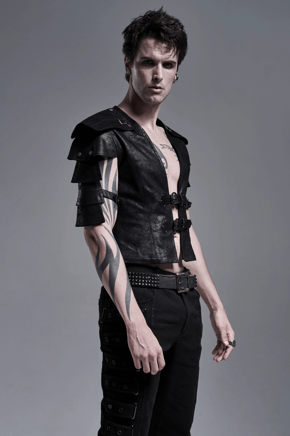 Full body gothic leather vest outfit showing layering and alternative fashion combination