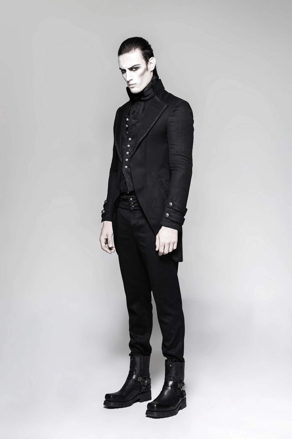 Full front view of black Victorian tailcoat gothic jacket on model in studio setting